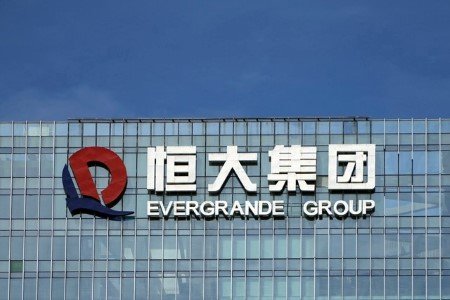 The company logo is seen on the headquarters of China Evergrande Group in Shenzhen, Guangdong province, China, September 26, 2021.