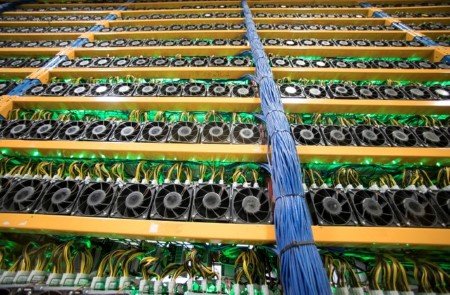 A file photo shows a wall of miners seen at the cryptocurrency farming operation, Bitfarms, in Farnham, Quebec, Canada, February 2, 2018.