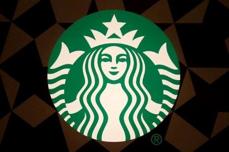 A file photo of a Starbucks logo pictured on the door of the Green Apron Delivery Service at the Empire State Building in the Manhattan borough of New York, U.S. June 1, 2016. 