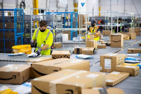 Workers in Amazon warehouse