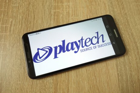 Playtech logo on a phone