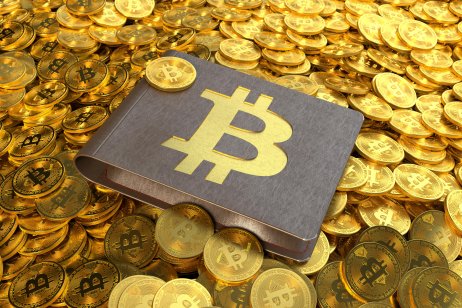 Bitcoins and wallet. Photo: Alamy 