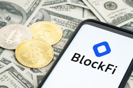 The BlockFi logo surrounded by cash and cryptocurrencies