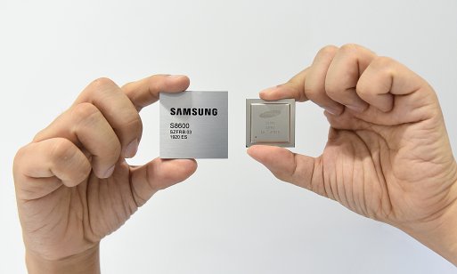 Samsung chips in a pair of hands