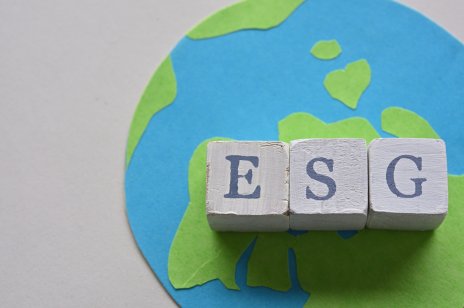 ESG cubes on earth paper cutout 