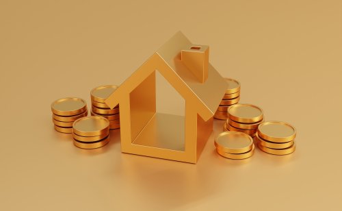 Gold coins next to a gold house