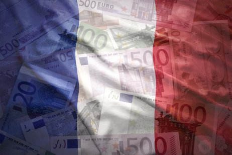 French flag (blue-white-red) with euro bills in the background