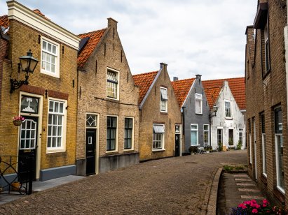 Traditional Dutch houses in a small village placed in South Holland