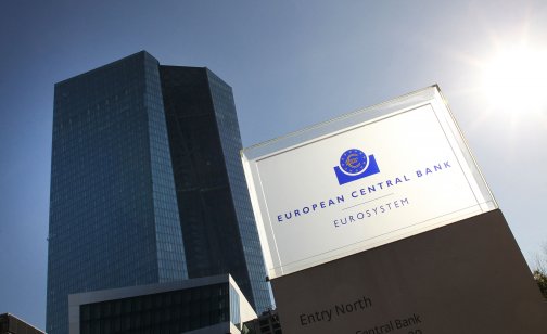The logo and the headquarters building of the European Central Bank (ECB)