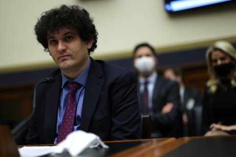  Sam Bankman-Fried testifies during a hearing before the House Financial Services Committee at Rayburn House Office Building on Capitol Hill 8 December, 2021 in Washington, DC