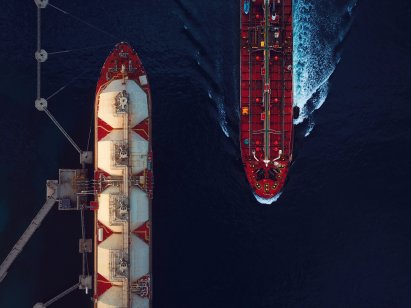 An aerial view of a liquified natural gas (LNG) tanker and a crude oil tanker