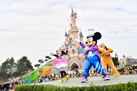 A image of a Disneyland theme park and its characters