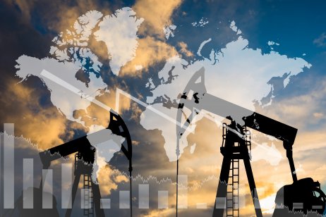 Oil pump on the background of a world map