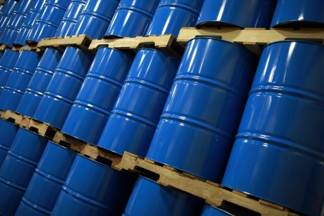 Blue oil drums stacked in a warehouse in Indiana, U.S