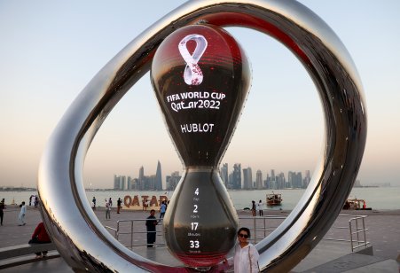 A fan poses in the Corniche area ahead of FIFA World Cup Qatar 2022 