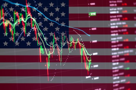 USA flag on the background of stock charts. Financial system in USA