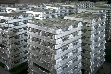 Stacks of aluminium bars in a factory