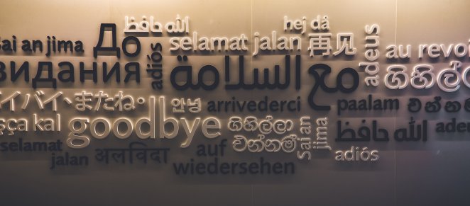 A board showcasing different languages for the word 