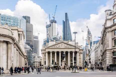 Street in City of London with Royal Exchange, Bank of England and new modern skyscrapers