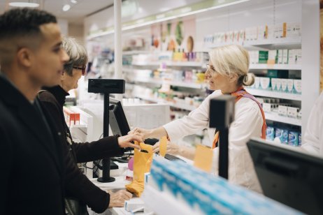 people shopping at a pharmacy 
