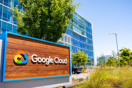 Google Cloud sign outside glass-fronted office building