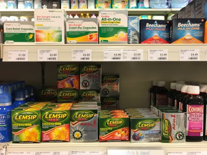 Shelves of cold and flu medicines.