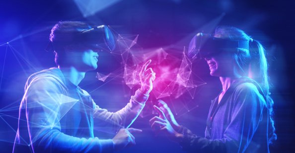 Two users enjoy the metaverse with virtual reality headsets