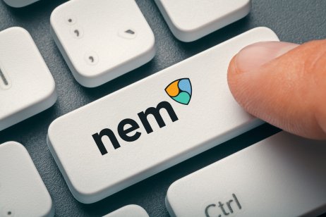 The NEM name and icon appear on a computer keyboard