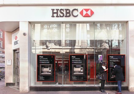 People using ATM outside HSBC in London