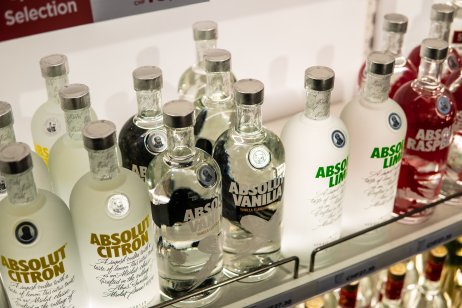 A picture of a bottle of Absolut Vodka on display for sale, brand of vodka produced in Sweden Owned by Pernod Ricard brand