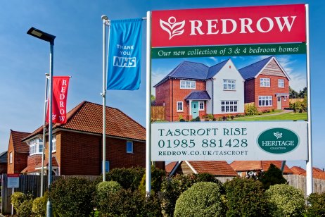 Redrow sign by new houses