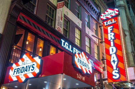 Red and white TGI Friday sign in Manhattan