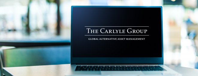 The Carlyle Group logo on a laptop computer