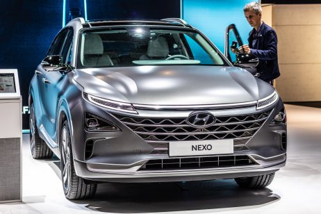 Visitor of Paris Motor Show checking on Hyundai's hydrogen-fuelled EV