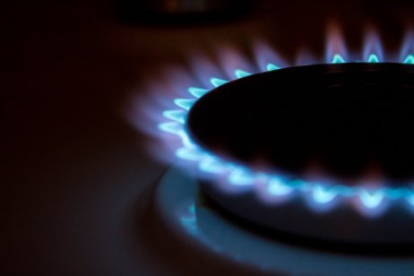 A gas stove burner on full flame