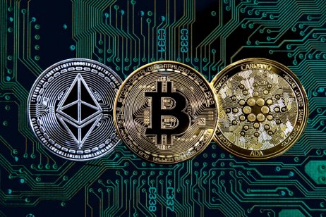 Bitcoin, ethereum (ether) and cardano cryptocurrency token coins against circuit board background