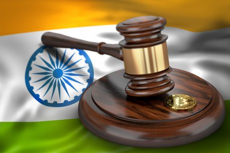 Bitcoin and judge gavel laying on flag of India. Bitcoin legal situation in India concept. 3D rendering