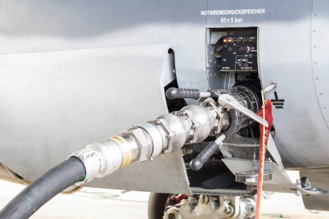 Fuel being pumped into a jet aircraft