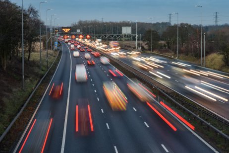 Fast-moving traffic drives along the M42 in Warwickshire during evening rush hour