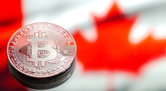 Coin with bitcoin (BTC) logo and Canada flag