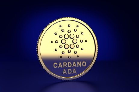 Cardano (ADA) coin on a blue background