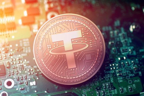Tether coin on blue motherboard background