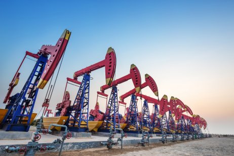 Row of jack pumps in an oil field