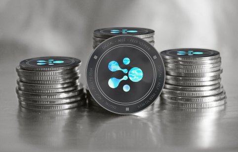 AELF (ELF) cryptocurrency. Stack of black and silver coins. Cyber money.