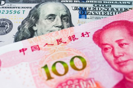 100 Yuan renminbi banknote and 100 dollar banknote 