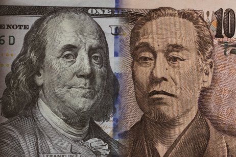 A composite picture of US and Japanese banknotes