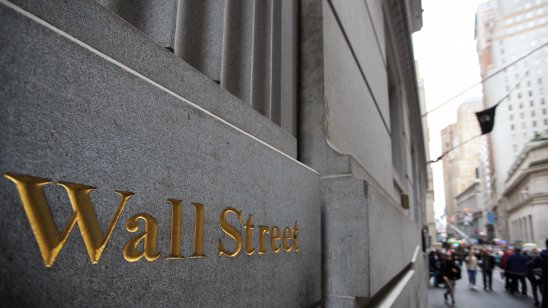 Wall Street signs on a building