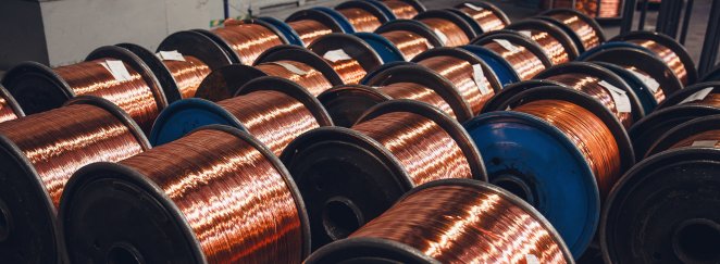 Rows of copper wire skeins being produced in a factory