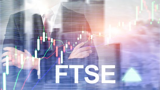 FTSE 100 Financial Times Stock Exchange Index United Kingdom UK England Investment Trading concept with chart and graphs.