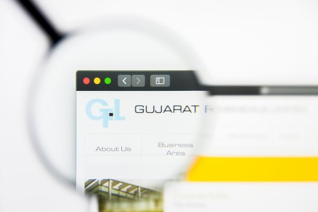 Gujarat Fluorochemicals logo displayed on a screen